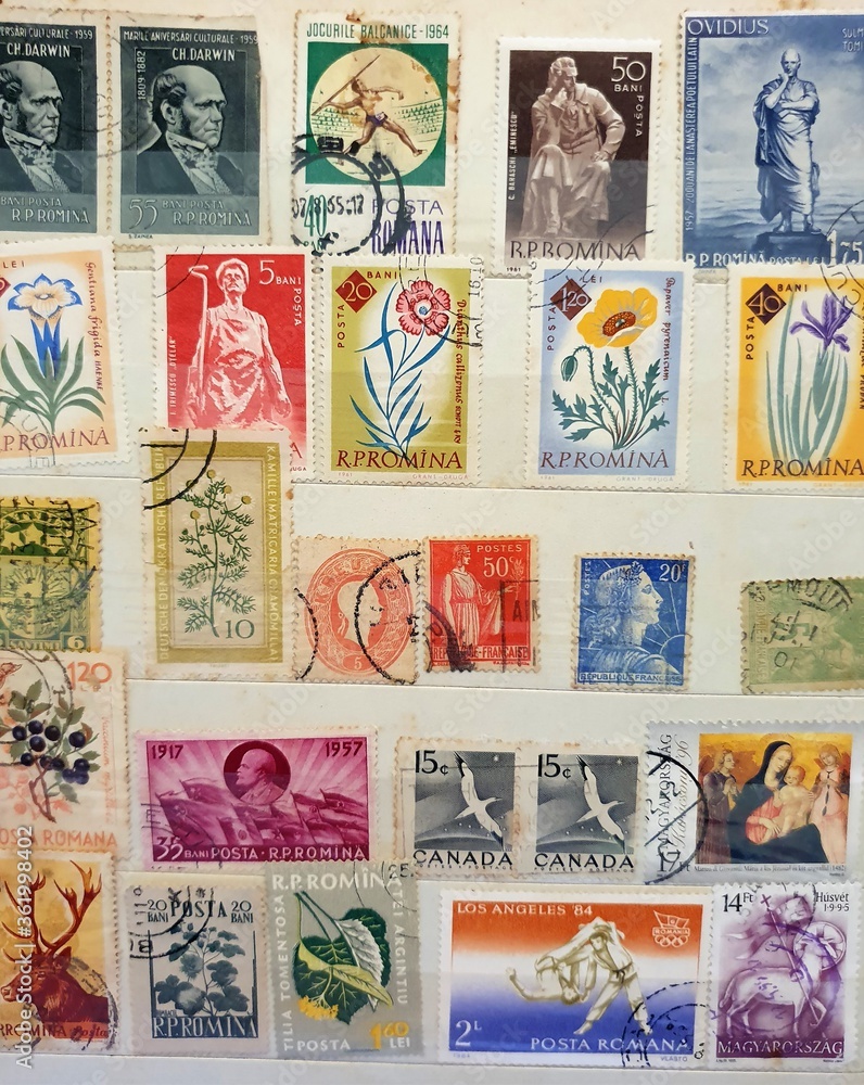 many old stamps on a philately catalog page