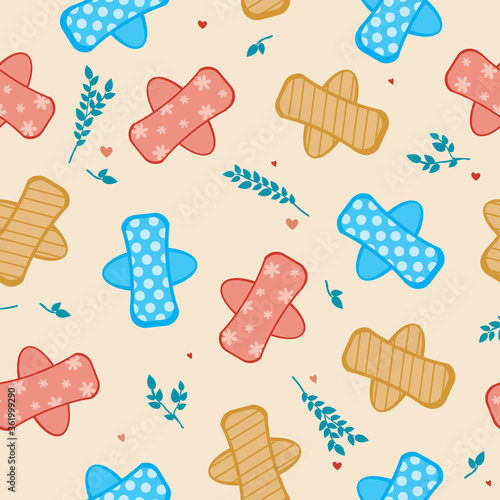 Seamless pattern with reusable absorbent fabric pads as backdrop or wallpaper, flat vector stock illustration with pad and plant leaves