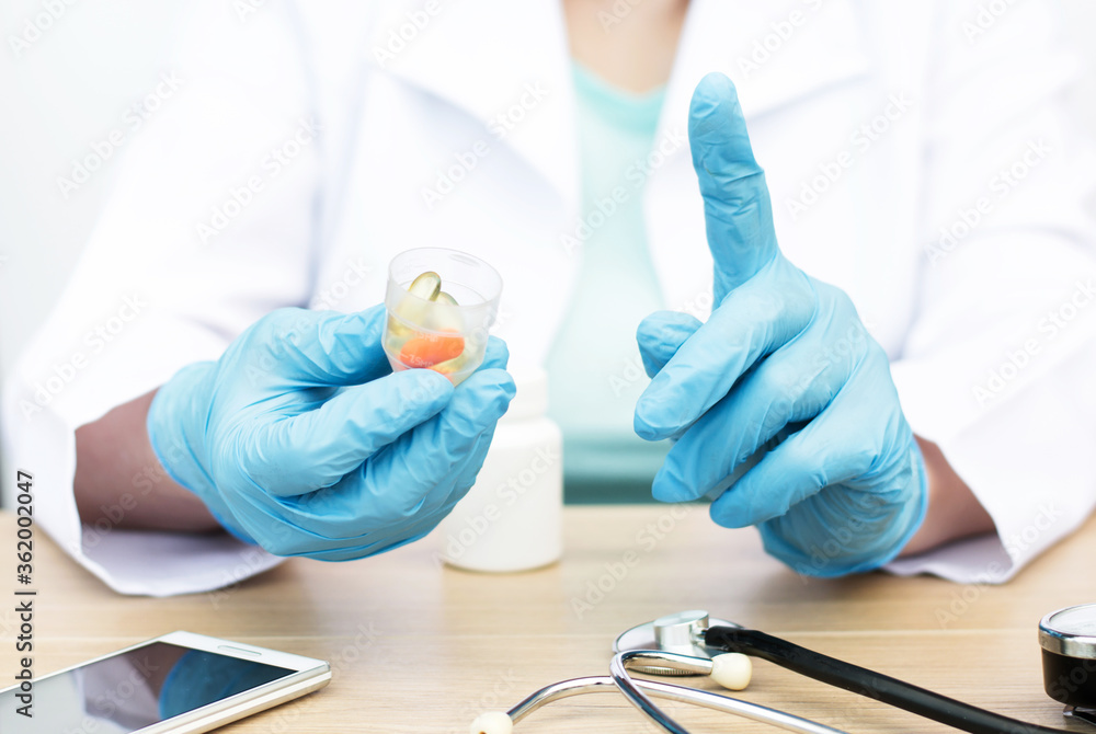 pills in the hands of a doctor close-up. Treatment concept pills in the hands of a doctor close-up. Treatment concept