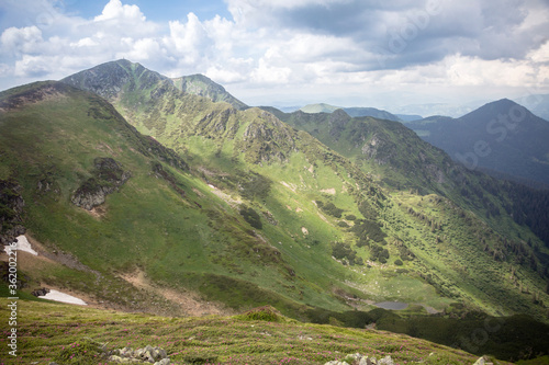 Summer panoramic landscapes of Popivan  Pip Ivan  mountain peak. Travel outdoor concept view of dramatic sky. Carpathians  Marmaroshchyna  Maramures  Ukraine