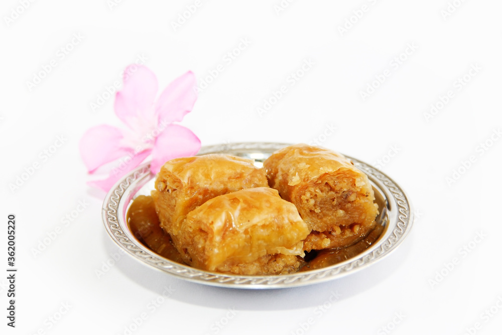 traditional Eastern Turkish sweet baklava on a decorative plate traditional Eastern Turkish sweet baklava on a decorative plate