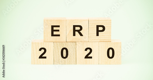 black letters erp and number twentieth year on wooden cubes