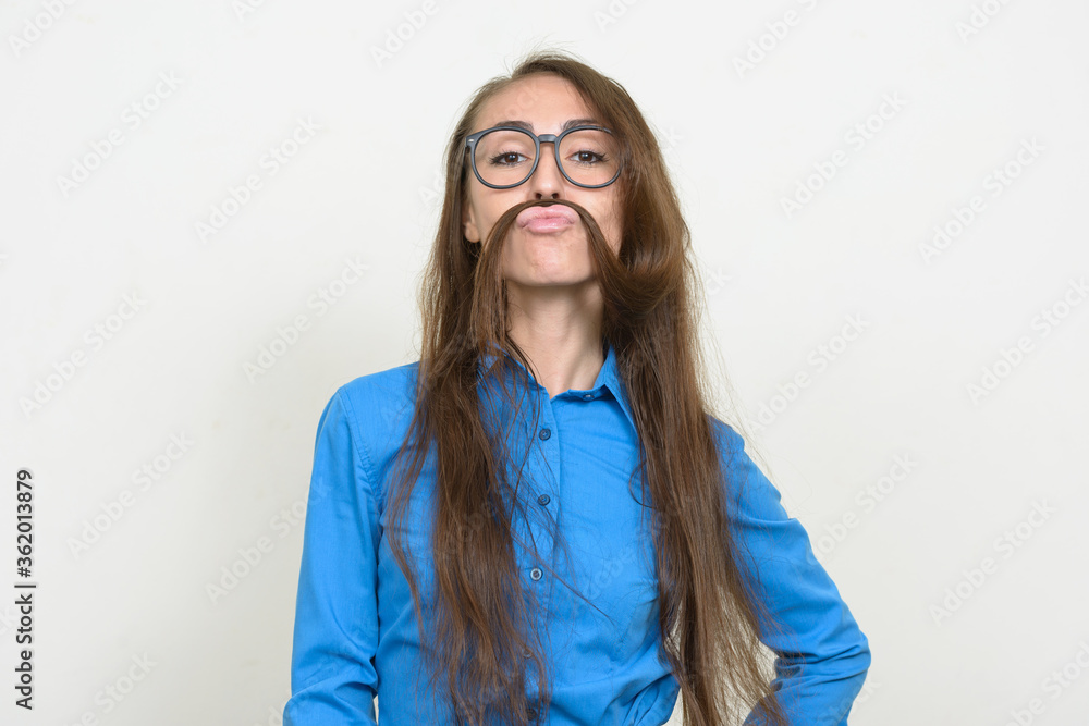 Portrait of young businesswoman with hair as mustache Portrait of young businesswoman with hair as mustache