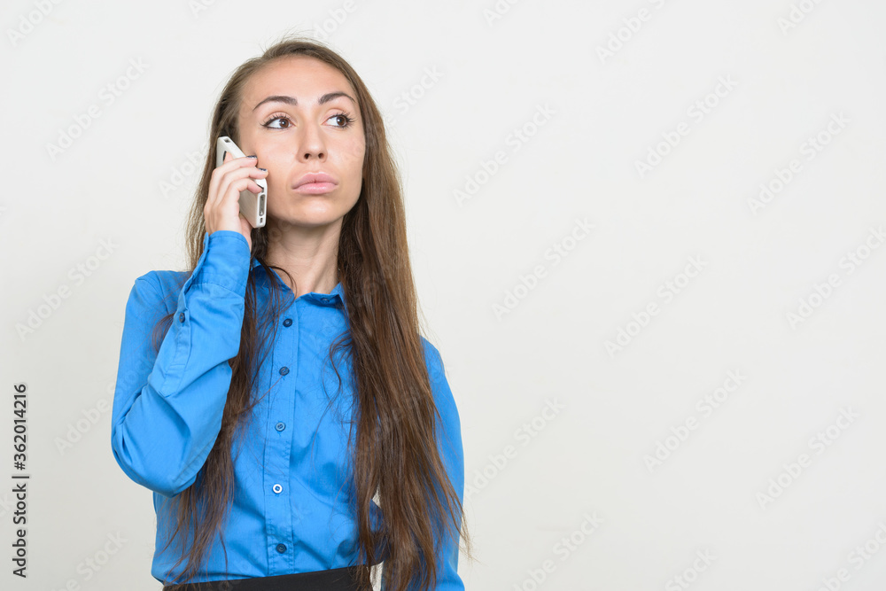 Portrait of young businesswoman talking on the phone Portrait of young businesswoman talking on the phone