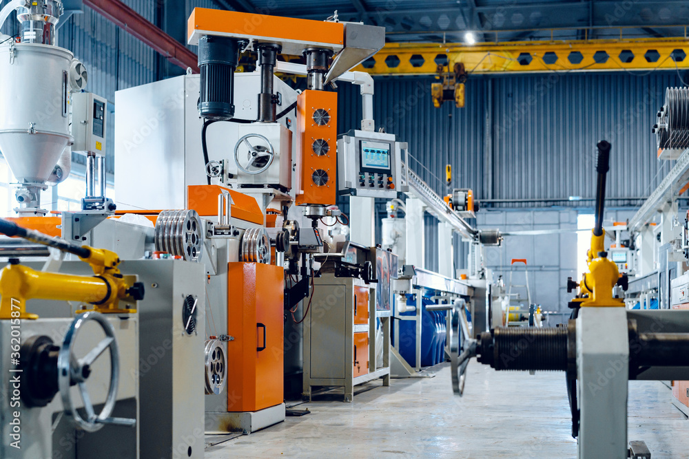 Inside the new factory manufacturing electrical cable. Cable production. Inside the new factory manufacturing electrical cable. Cable production.