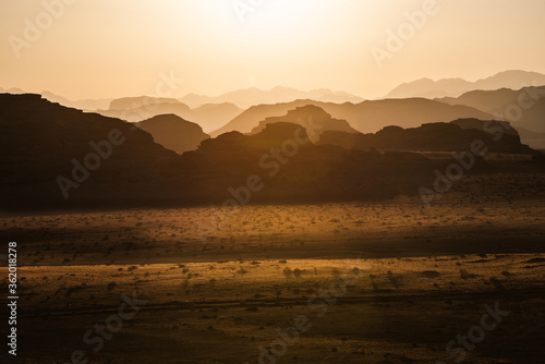 Golden sunst over a mountain range in Jordan