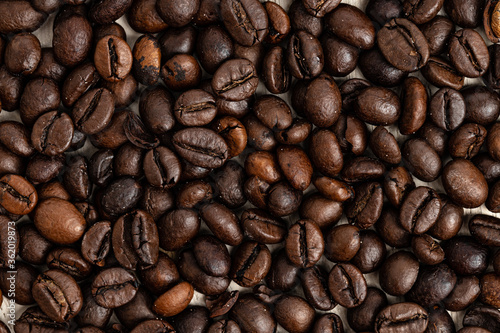 Background of roasted coffee beans, top view