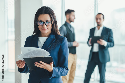 Business people analysing risks for their business in office environment.