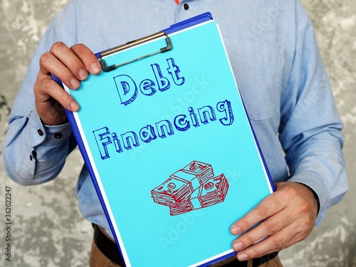 Conceptual photo about Debt Financing with handwritten text.