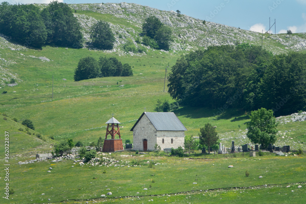 Old church and cemetery below Durmitor mountain