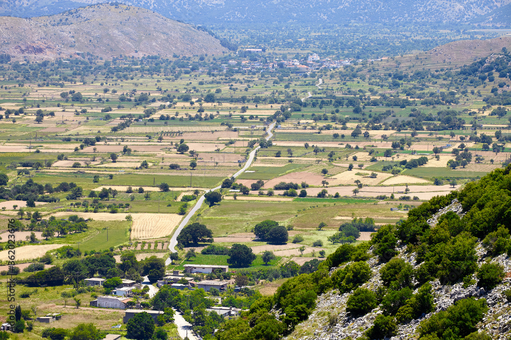 Aerial view of mediterranean rural landscape. Greek agricultural background with olive groves, vineyards and orchards