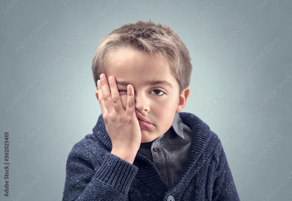 Boy feeling fed up, depressed, bored or stressed and showing despair  Stock-Foto | Adobe Stock