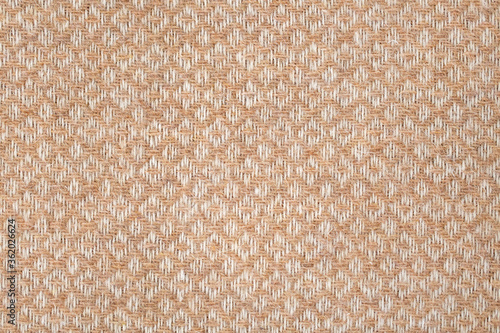 Foto Brown and white geometric woolen fabric textured background, machine woven pattern texture