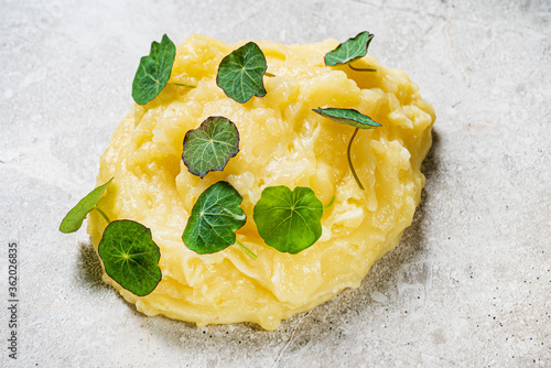 mashed potato with nasturtium leaves