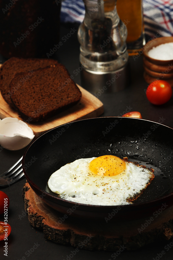 Fried egg with tomatoes and bread Fried egg with tomatoes and bread