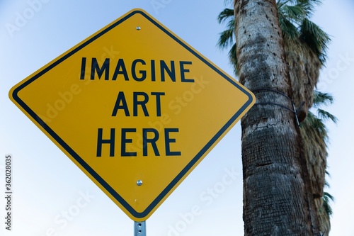Imagine Art Here Sign with Palm Tree in Downtown Palm Springs California