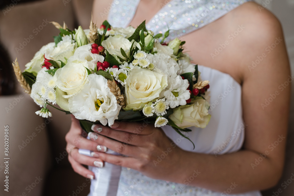 the bride's bouquet, bride holding bouquet, wedding day, bride in wedding dress, morning bride