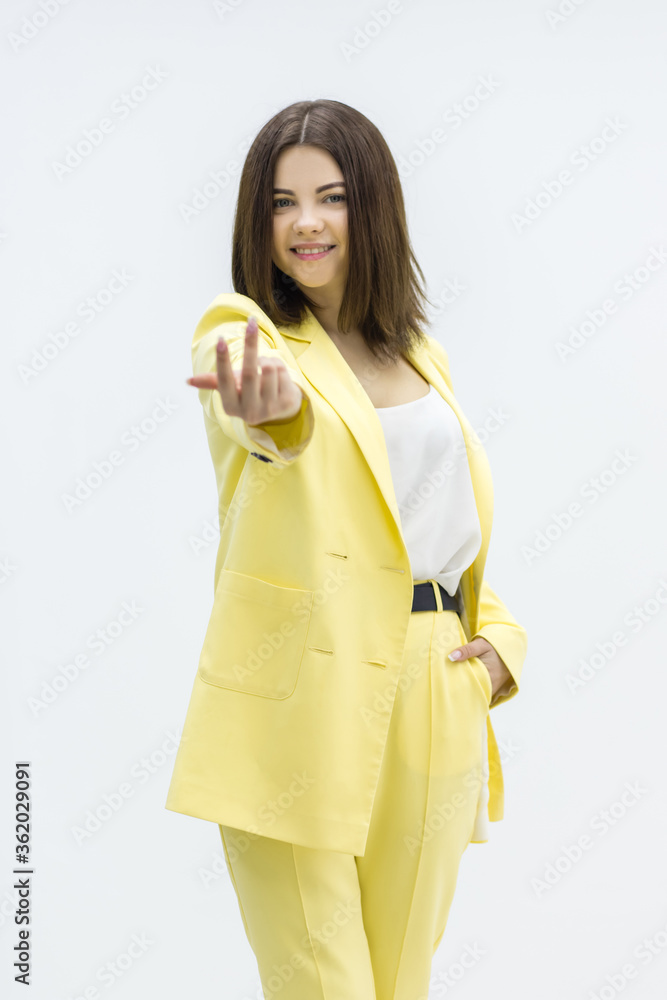 Young pretty girl inviting to come, confident and smiling. Young pretty girl inviting to come, confident and smiling.