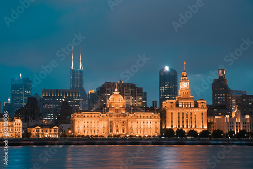 Night view of Shanghai s bund  the historic and modern building skyline along the Huangpu River  China.