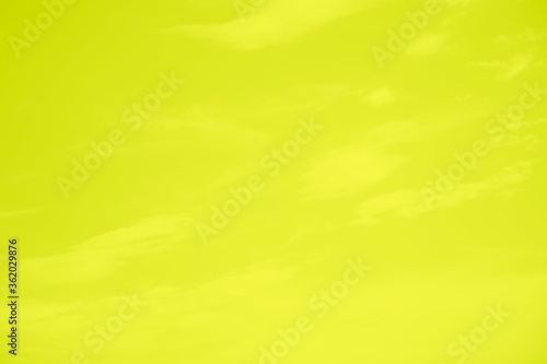 Abstract vivid yellow background  blurred sunny color