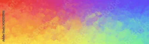 Colorful watercolor background of abstract bright rainbow colors of red orange green blue yellow blue and purple
