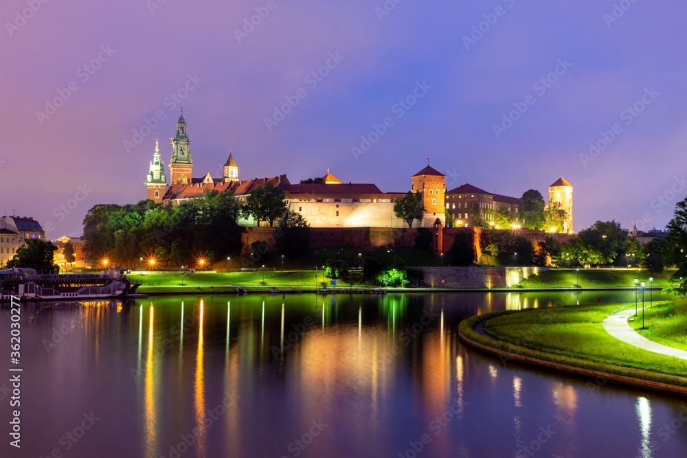 Wawel castle in Krakow at Vistula river at night, Poland