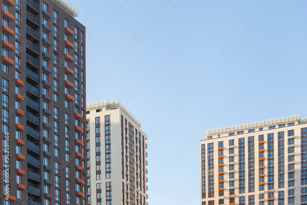 Modern and new apartment buildings. Multistoried modern, new and stylish living block of flats. Real estate. New house.Newly built block of flats.