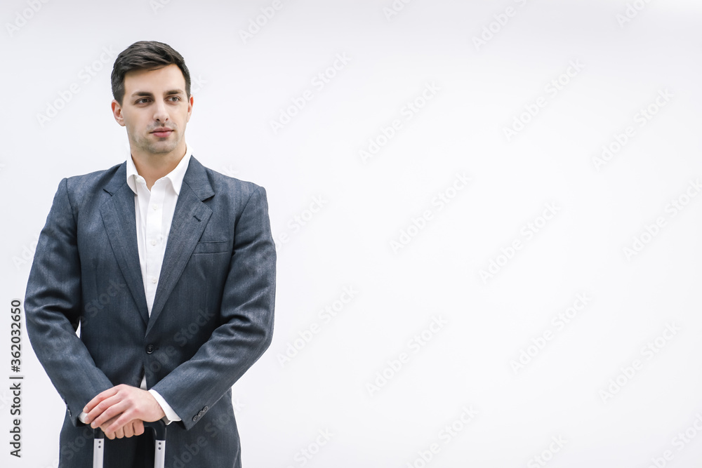 Male passenger waiting in queue to check in and drop off luggage over white background. Male passenger waiting in queue to check in and drop off luggage over white background.
