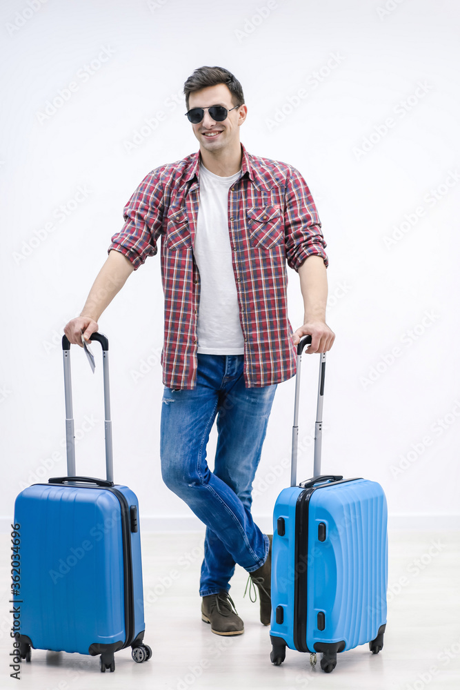 Young man looks into distance, in antitipation of new destination and adventures. Young man looks into distance, in antitipation of new destination and adventures.