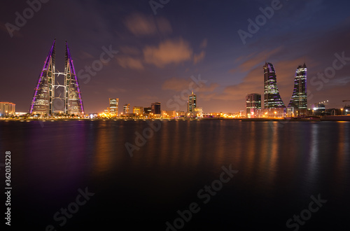 MANAMA, BAHRAIN -  OCTOBER 28: Bahrain skyline with iconic buildings, the Bahrain World Trade Center and the Financial Harbour during dusk on October 28, 2018, Manama, Bahrain © Dr Ajay Kumar Singh