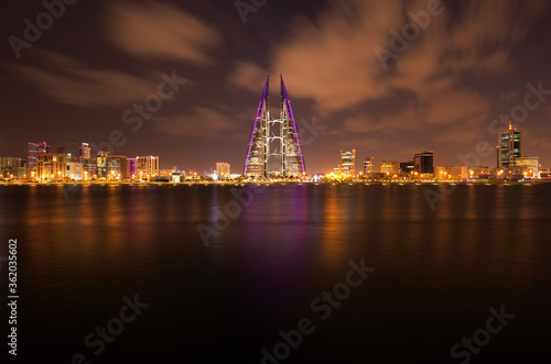 MANAMA, BAHRAIN - OCTOBER 28: The Bahrain World Trade Center during dusk, a twin tower complex is the first skyscraper in the world to have wind turbines, October 28, 2018, Manama, Bahrain © Dr Ajay Kumar Singh