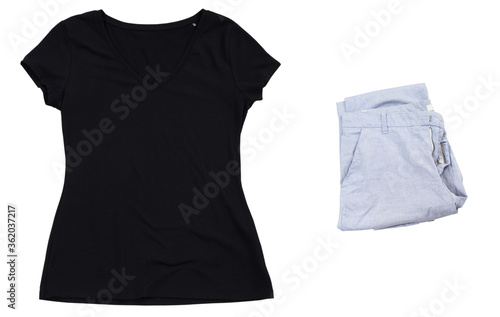 Summer black t-shirt and folded pants isolated mock up, empty black t shirt close up