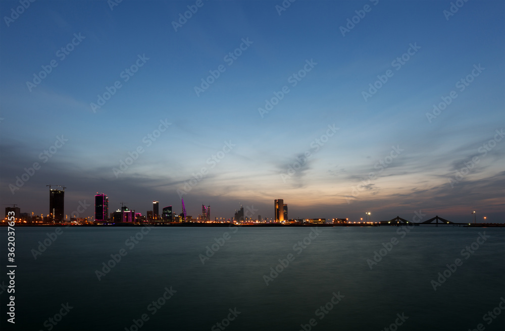 Bahrain skyline during bluehours with dramatic cloud in the evening,