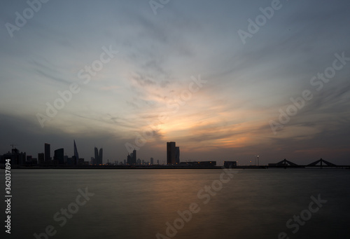 Dramatic sky and Bahrain skyline during dusk