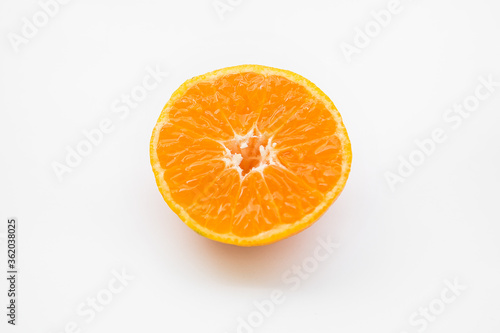 cut orange on a white background