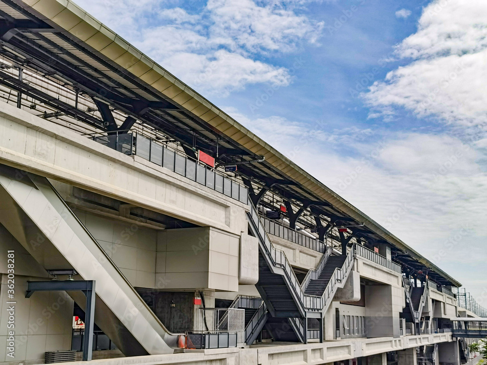 Fototapeta premium Architecture construction of elevator, escalator stairs and sky walk way, walk bridge between sky train station and department store mall