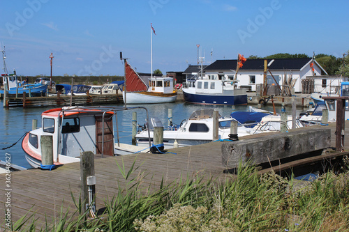 The tiny but picturesque Tars fishing marina and harbour, on the island of Lolland in Denmark. A pretty travel destination 'off the beaten track', on a sunny summers day.