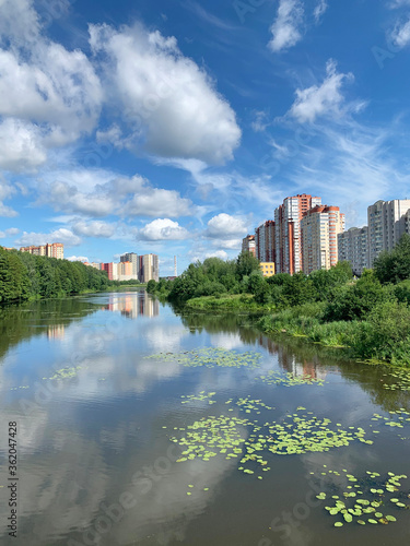 Russia, Moscow region, the city of Balashikha. Pekhorka river in summer sunny day and view of Zarechnaya street