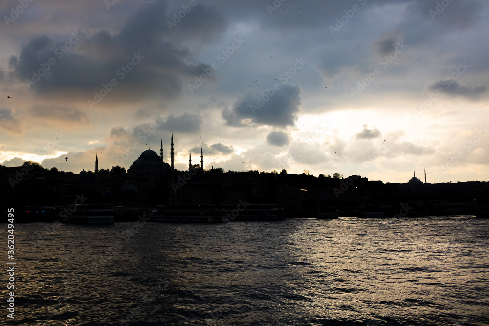 Suleymaniye Mosque at Sunset with cloudy sky in Istanbul