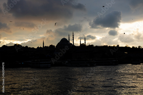 Suleymaniye Mosque at Sunset with cloudy sky in Istanbul