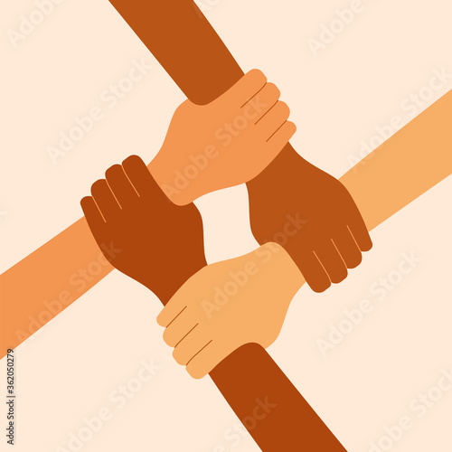 Four diverse hands holding each other. People together.
