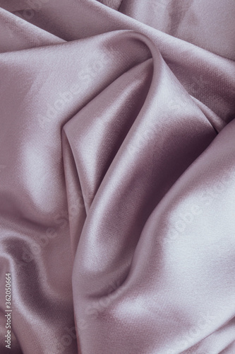 Pink soft fabric satin shaped as female genital organs photo