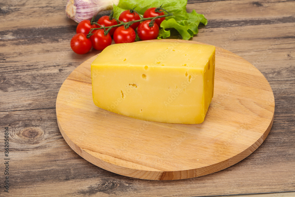 Hard yellow tasty cheese brick Hard yellow tasty cheese brick