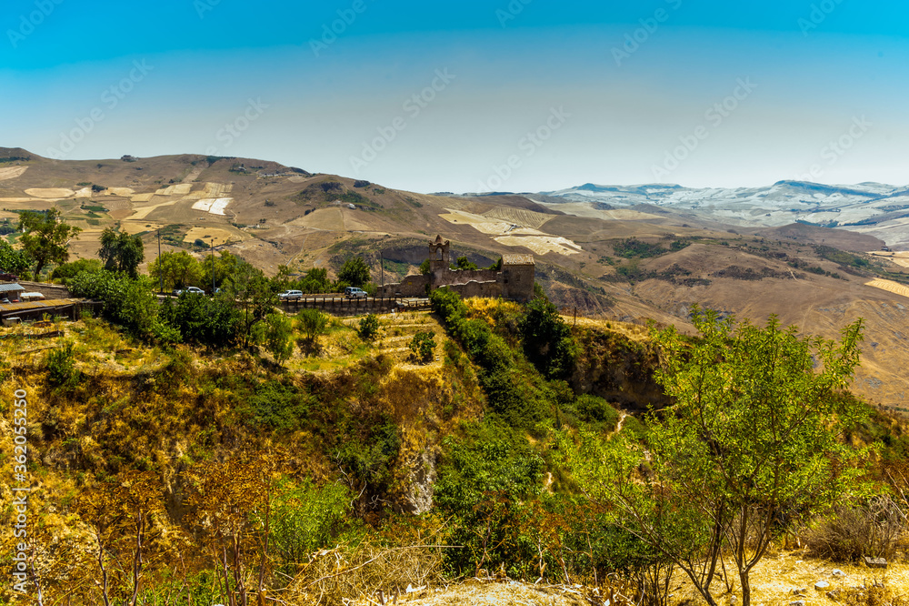 A view from Polizzi Generosa towards an abandoned building in the Madonie Mountains, Sicily in summer
