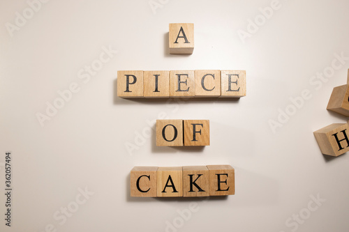 In terms of easy work, A piece of cake. Written from wooden cubes.