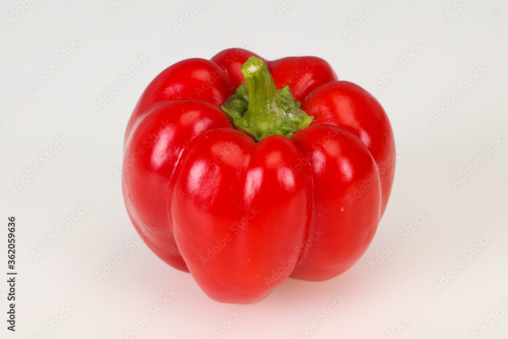 Ripe red bell pepper isolated on white Ripe red bell pepper isolated on white