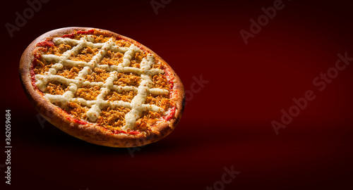 Pizza chicken and catupiry cheese on red background. close up. Traditional Brazilian Pizza photo