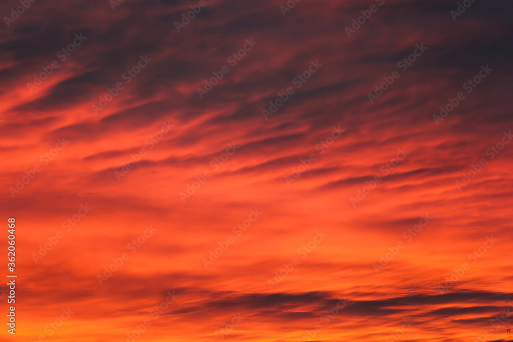 Dark orange clouds at sunset.