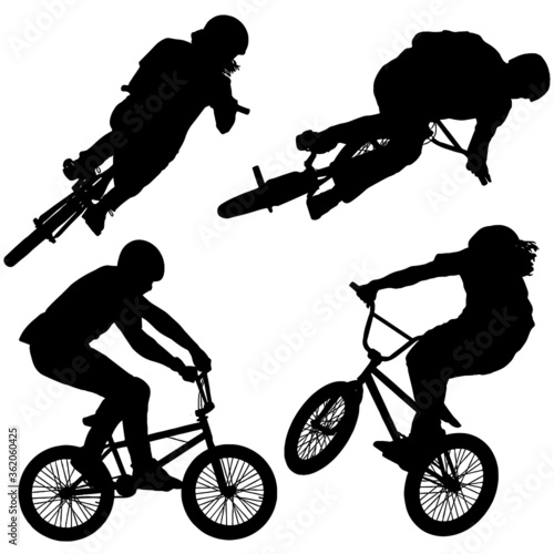 vector silhouette of 4 BMX bike riders 