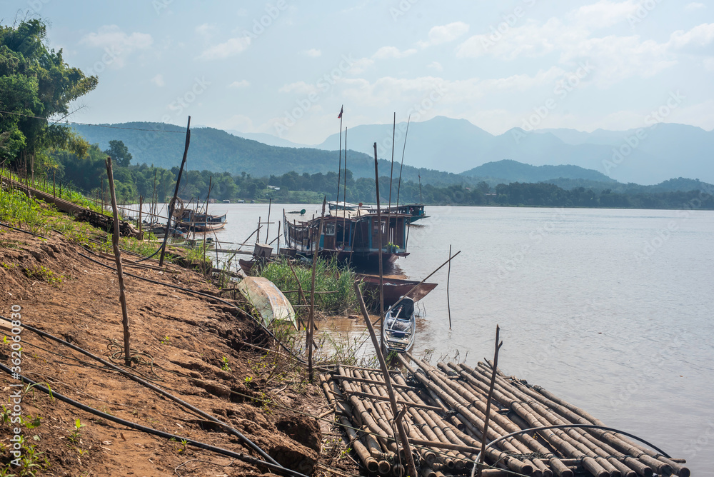 sailing on a brown, muddy Mekong River